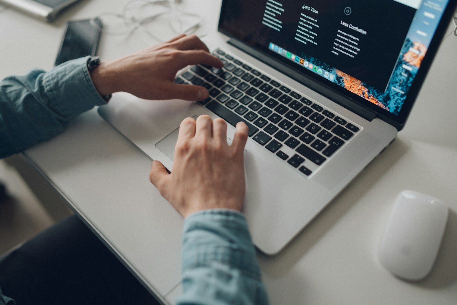 person wearing long-sleeve top working on laptop; Next.js RCE vulnerability