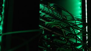 a close up of a rack of computer equipment; FedRAMP-ready hardened container images