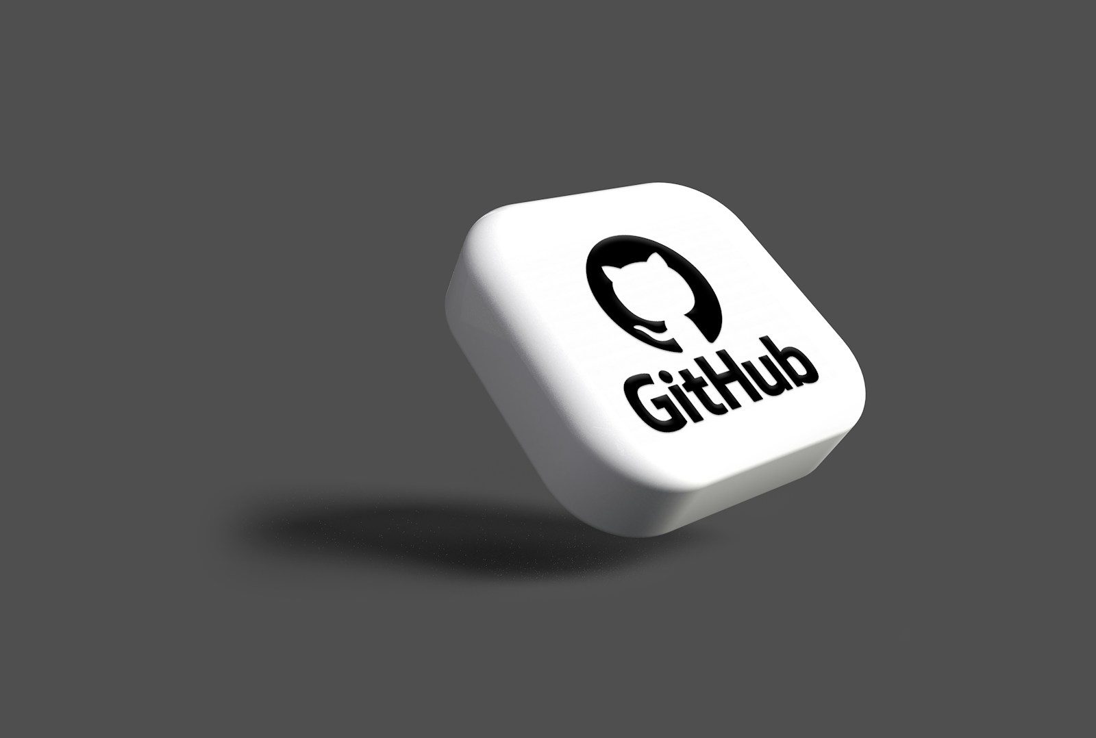 a white dice with a black github logo on it; GitHub Copilot Fusion