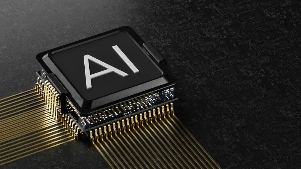 A black computer processor chip with gold pins on a dark circuit board; AI code review benchmark
