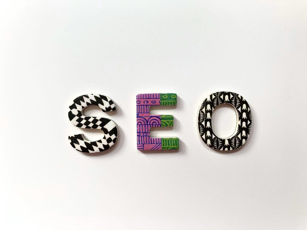 The letters S, E, and O with patterned surfaces on a white background; SEO APis