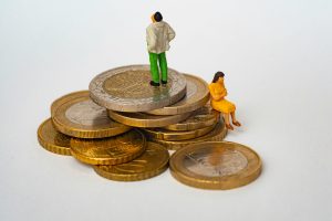 people standing on coins