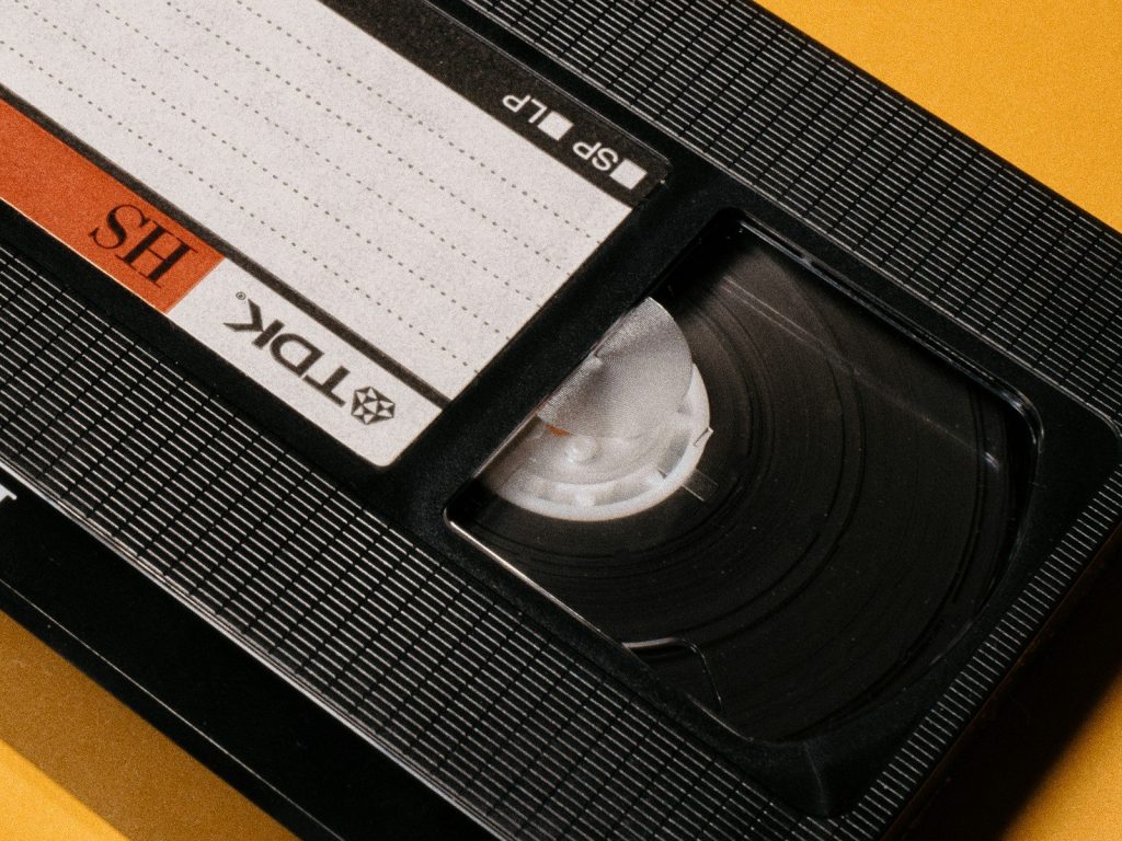 a close up of an old school cassette; ai video generator