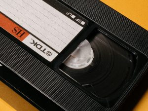 a close up of an old school cassette; ai video generator