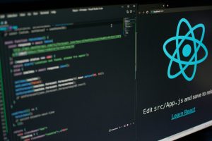 a computer screen with a logo on it; React 19.3